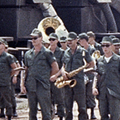 31 October 1969: The New Zealanders are entertained by the USARV Band during their visit to Long Binh. Men in green military uniforms standing in rows holding musical instruments