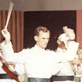 1 November 1969: The band records a set of televised Christmas carols and interlude numbers for the American Forces Vietnam Network (AFVN) in Saigon. Military band in formal uniform playing instruments in front of television camera