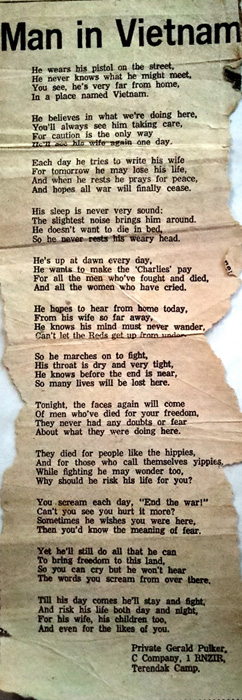 Worn newspaper article with the words of a poem printed on it.
