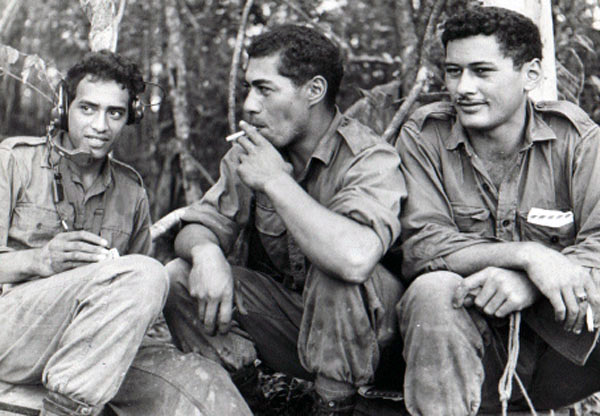 Awaiting a resupply, circa 1967-1968. Left to right: Pat Nuku, Ben Hetaraka, and George Taia Awaiting a resupply, circa 1967-1968. Left to right: Pat Nuku, Ben Hetaraka, and George Taia