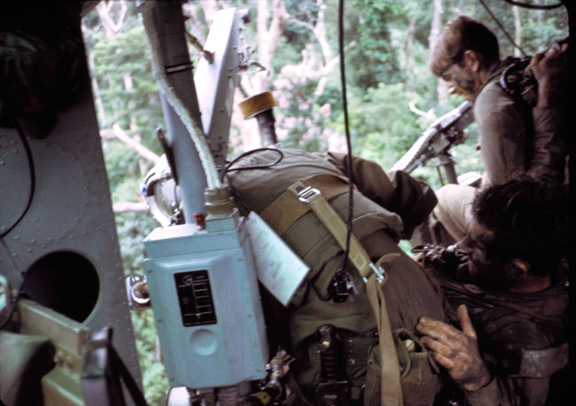 Crew pull a SAS trooper into helicopter Crew pull a SAS trooper into helicopter