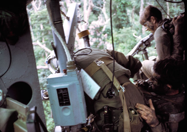 Crew pull a SAS trooper into helicopter