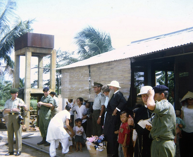 Lt-Col Rob Smith visits Binh Loi orphanage, circa 1967