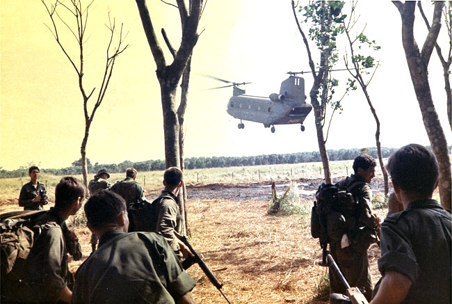 The band waits to board a Chinook helicopter - 1RNZIR Band Tour, 1969