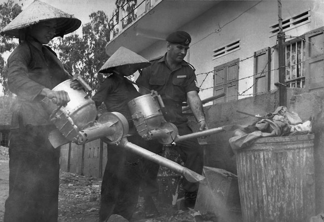 Spraying for insects at Qui Nhon, 1968