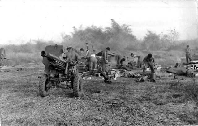 161 Battery gunners clean up after fire mission, 1967 161 Battery gunners clean up after fire mission, 1967