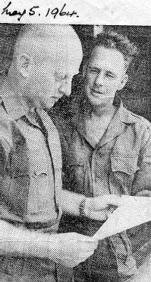 Sergeant's P. Quinn and J. W. Carter discuss troop newspaper, 5 May 1964 Sergeant's P. Quinn and J. W. Carter discuss troop newspaper, 5 May 1964