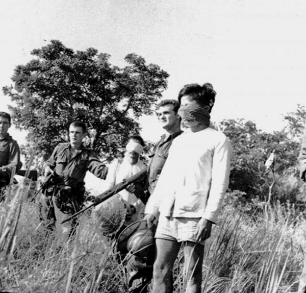 Australian soldiers escort Viet Cong prisoners, 1966 Australian soldiers escort Viet Cong prisoners, 1966