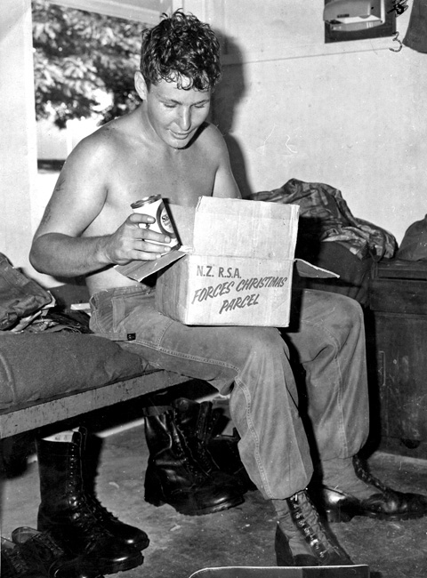 Private Wayne Lindsay with RSA Christmas parcel, circa 1968