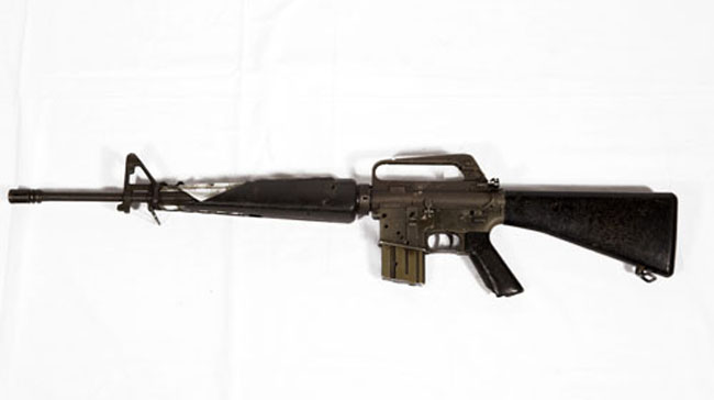 Battle damaged M16 automatic rifle