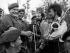 Fred Summer and Kevin Rongonui share a joke with New Zealand soldiers at Nui Dat, 1969