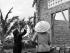 A nun lends a hand during the construction of a new classroom at Binh Loi orphanage, circa 1969