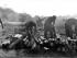 Gunners clean up after heavy fire mission in Vietnam, circa 1966-1967