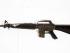 Battle damaged M16 automatic rifle