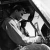 F/O Butler and F/O Creelman carry out final pre-flight checks in the cockpit of a Iroquois helicopter