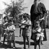 Father Olivier and children at Binh Loi Orphanage