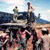 Loading sandbags on truck, circa 1968-1969