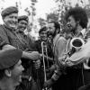Fred Summer and Kevin Rongonui share a joke with New Zealand soldiers at Nui Dat, 1969