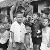 SSgt Graham (Dick) Grigg with Vietnamese orphans