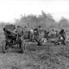 161 Battery gunners clean up after fire mission, 1967