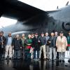 V4 veterans in front of the C-130 Hercules aircraft that flew them to Vietnam in May 1969