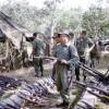 Bdr Val Litchfield holding captured AK47 rifle