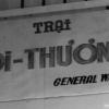 Sign for Qui Nhon hospital written in Vietnamese apart from 'General Ward'