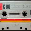 Cassette tape with 'This side' handwritten on it
