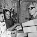 Claire Jacobson hands out lunch to Major P.G. Hotop and his wife