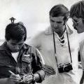 Peter Crotty [middle] in conversation with South Vietnamese pilot, circa 1973