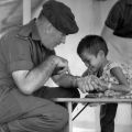 Ken Treanor with Vietnamese orphan in Qui Nhon, 1968