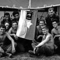 New Zealand soldiers with a souvenired North Vietnamese flag, circa 1969