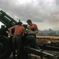 Preparing to fire M101A1 Howitzer, circa 1966-1967