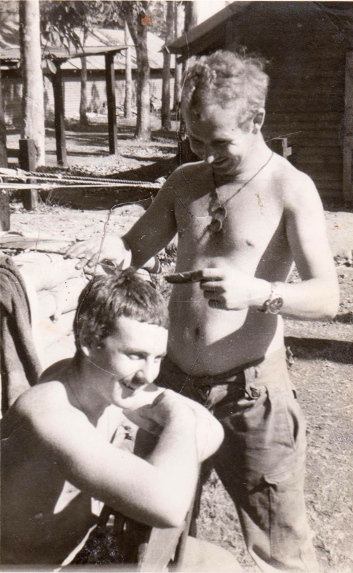 RW Urwin (left) getting his hair cut, circa 1968-1969